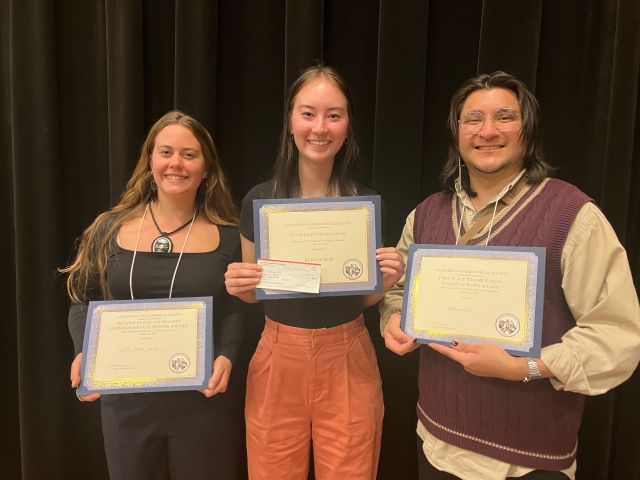 Lena, Kathryn, and Germán with their awards.